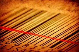 A barcode being scanned by a red laser